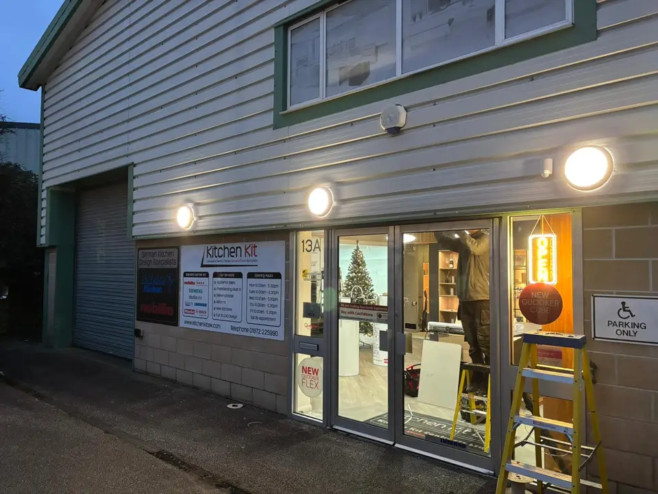 External bulkhead lighting installed on a commercial showroom